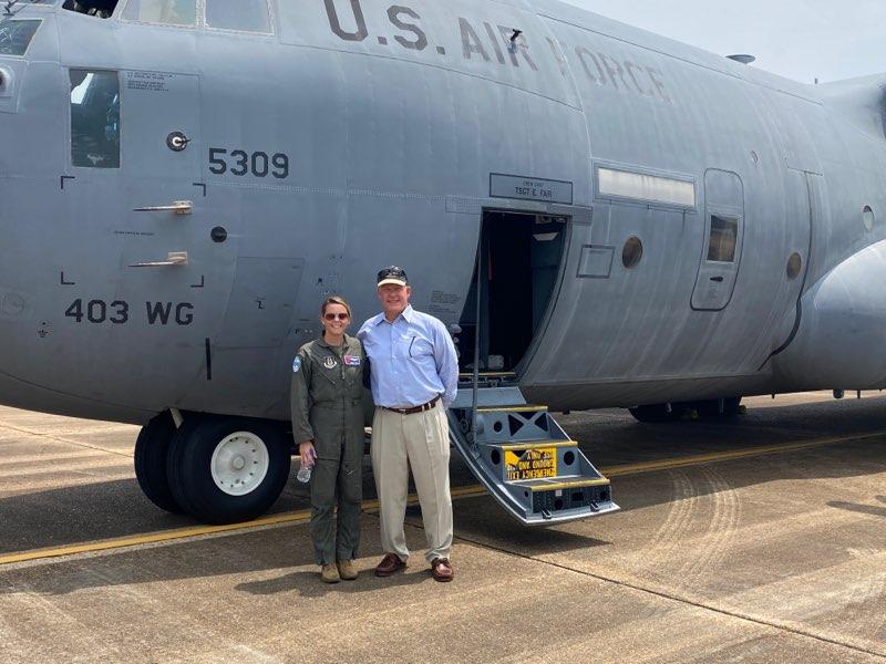 Ashley with Mark in front of a WC-130 Hurricane Hunters aircraft