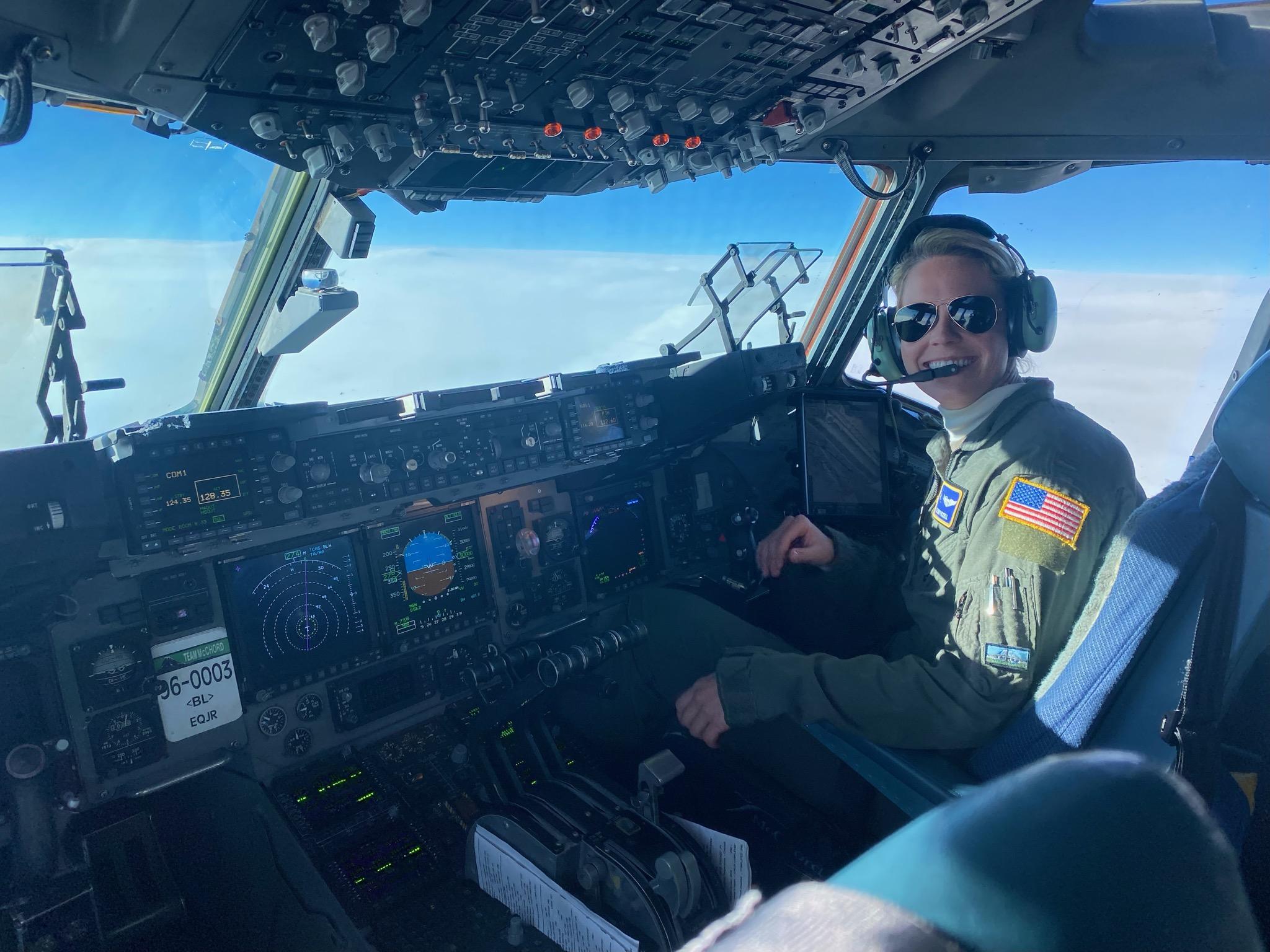 Cassidy in the cockpit of a C-17 Globemaster