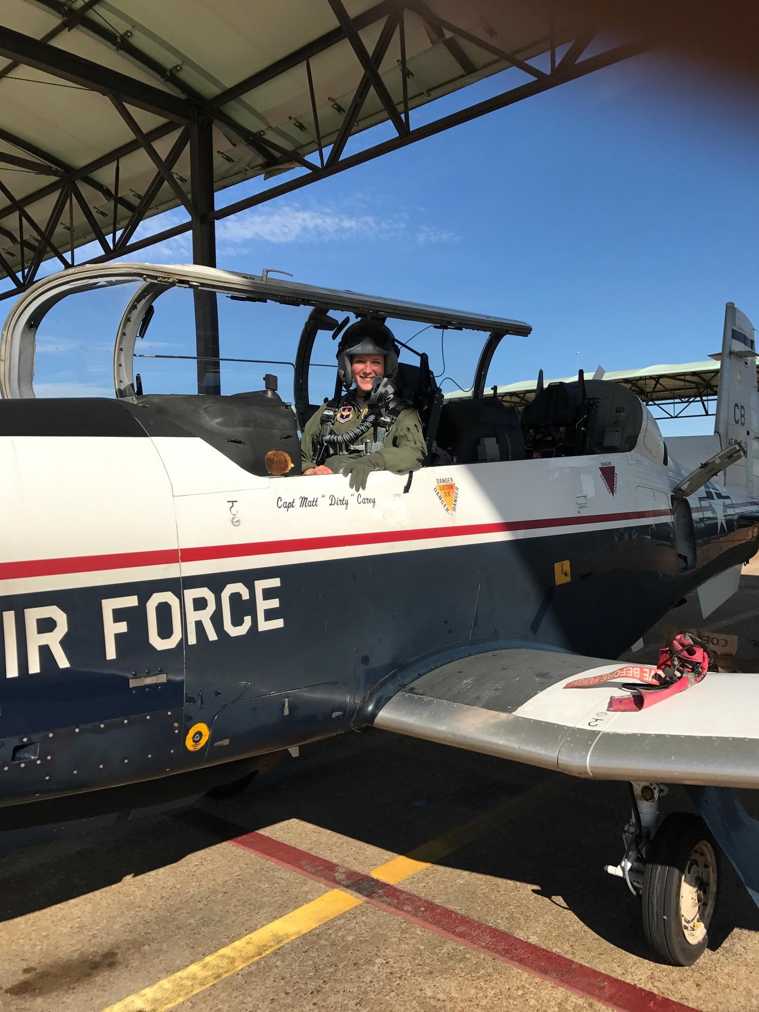 Leesa in the cockpit of a T-6 Texan II